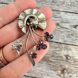 Vintage sterling silver & purple rhinestone floral brooch pin